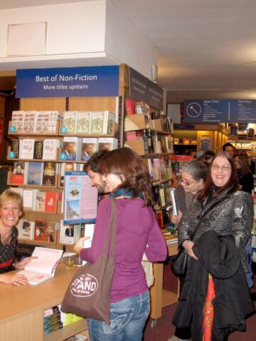 Jill Colonna, author of Mad About Macarons, at a book signing event at WHSmith Paris