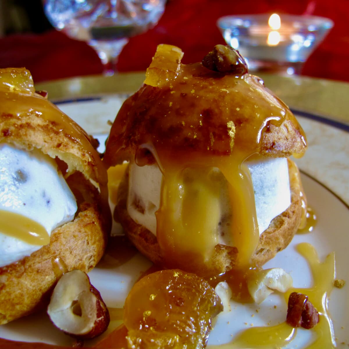 choux buns filled with nougat ice cream and dribbling caramel candle cosy atmosphere