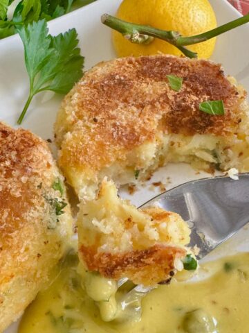 cutting into fluffy smoked haddock fishcakes