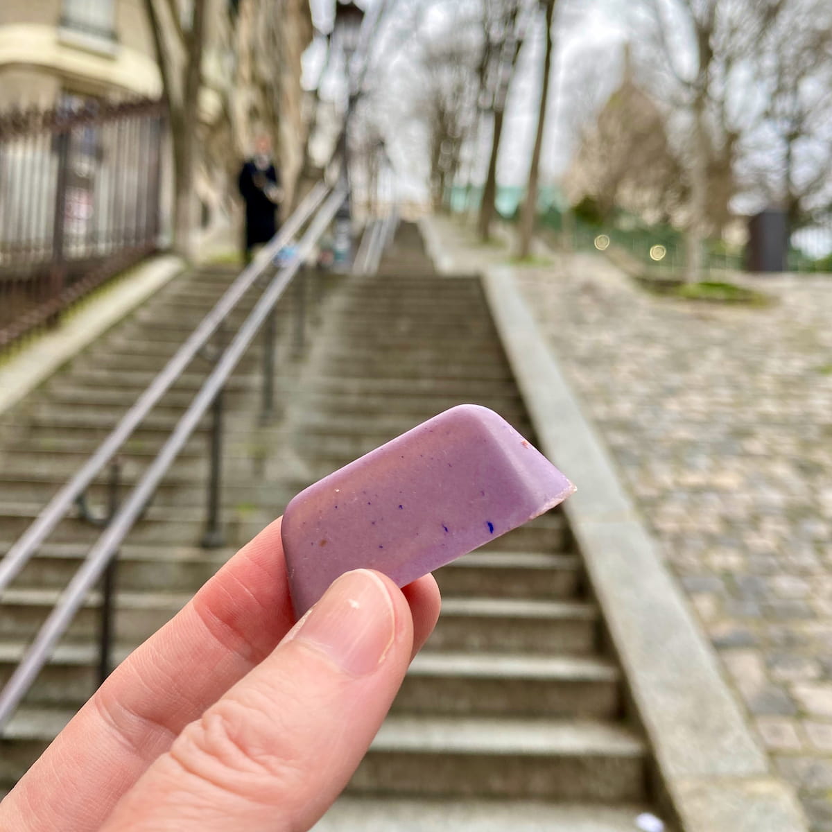 a purple blackcurrant chocolate at the steps of Montmartre