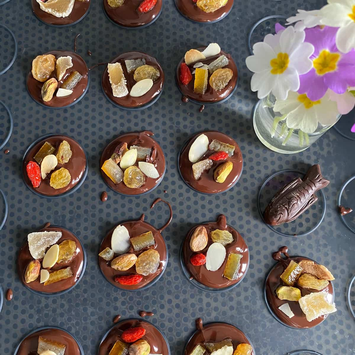 melted chocolate disks on a mat