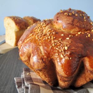 classic shape of a Parisian brioche with a little round head on top