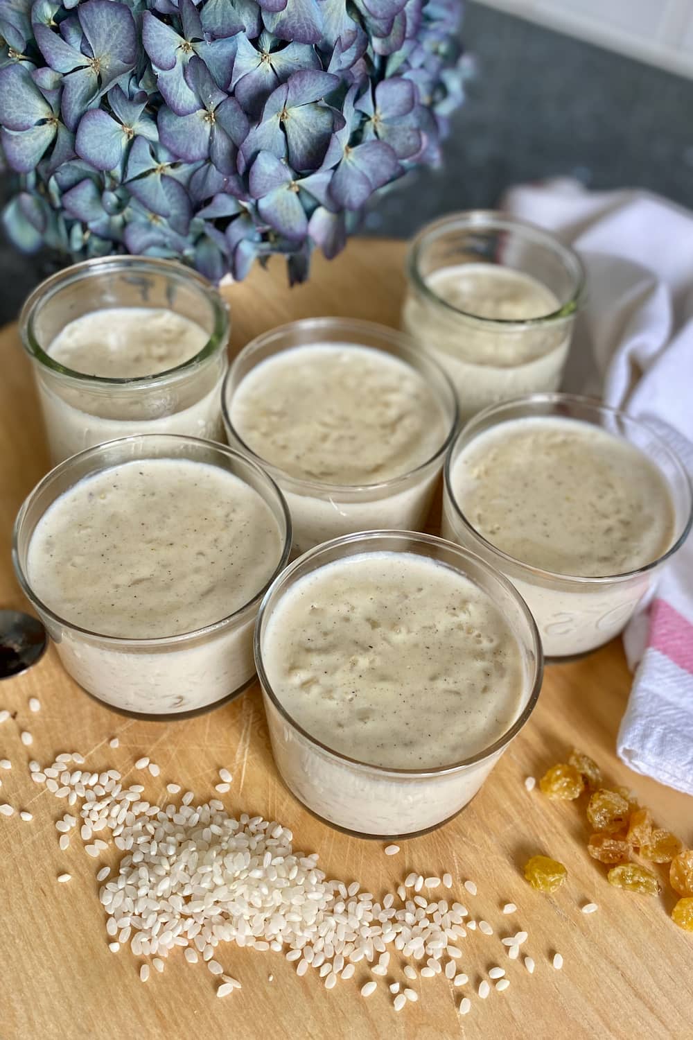 glass pots of creamy rice puddings