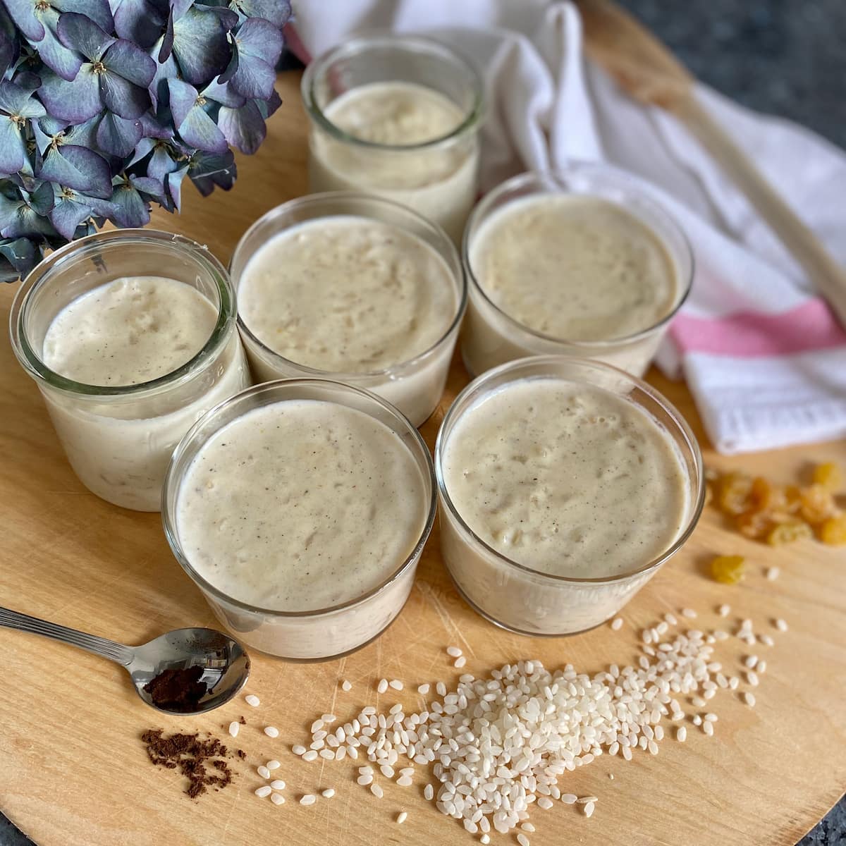 glass pots of creamy rice puddings