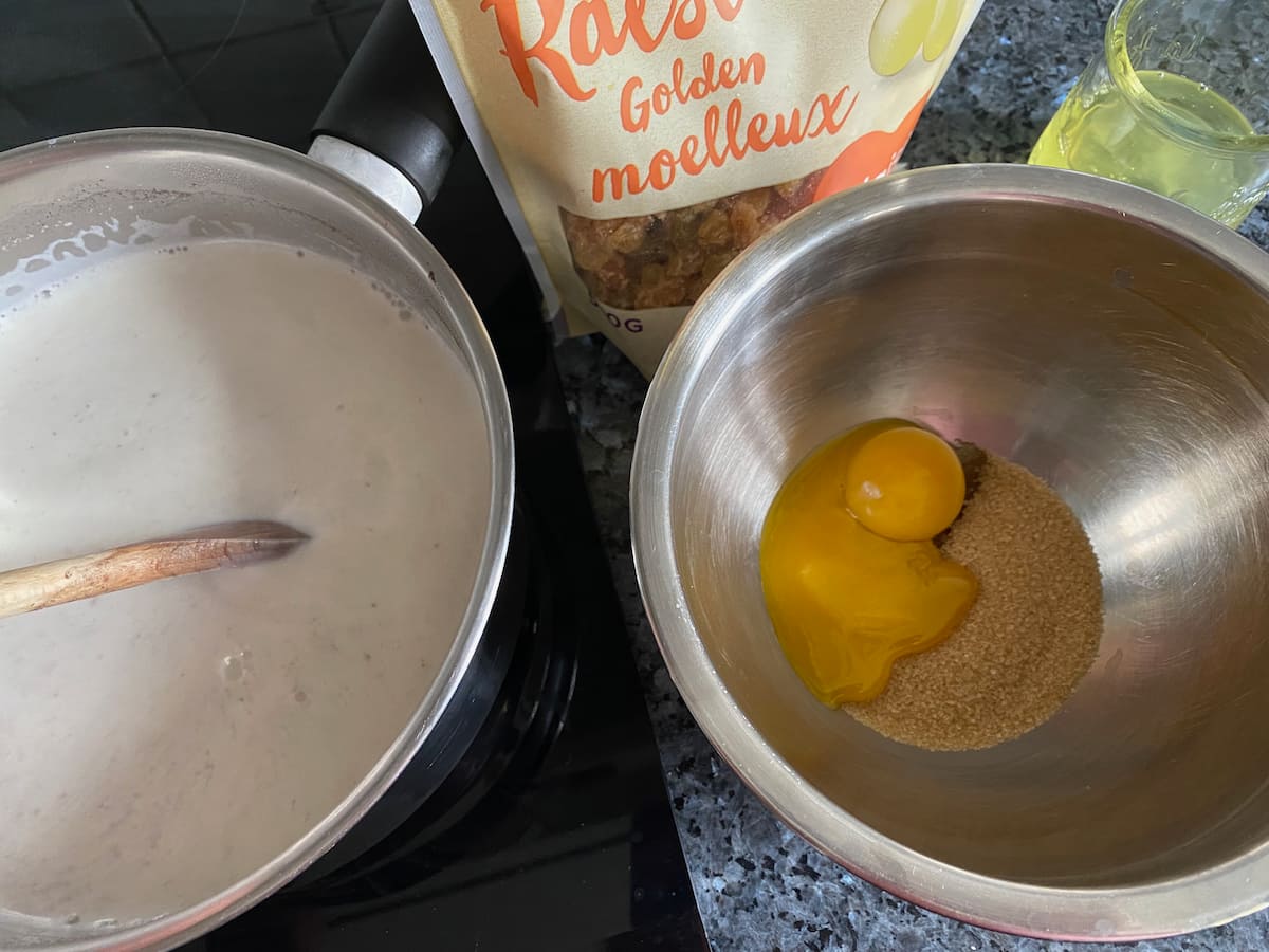 preparing rice pudding with bowl of yolks and sugar