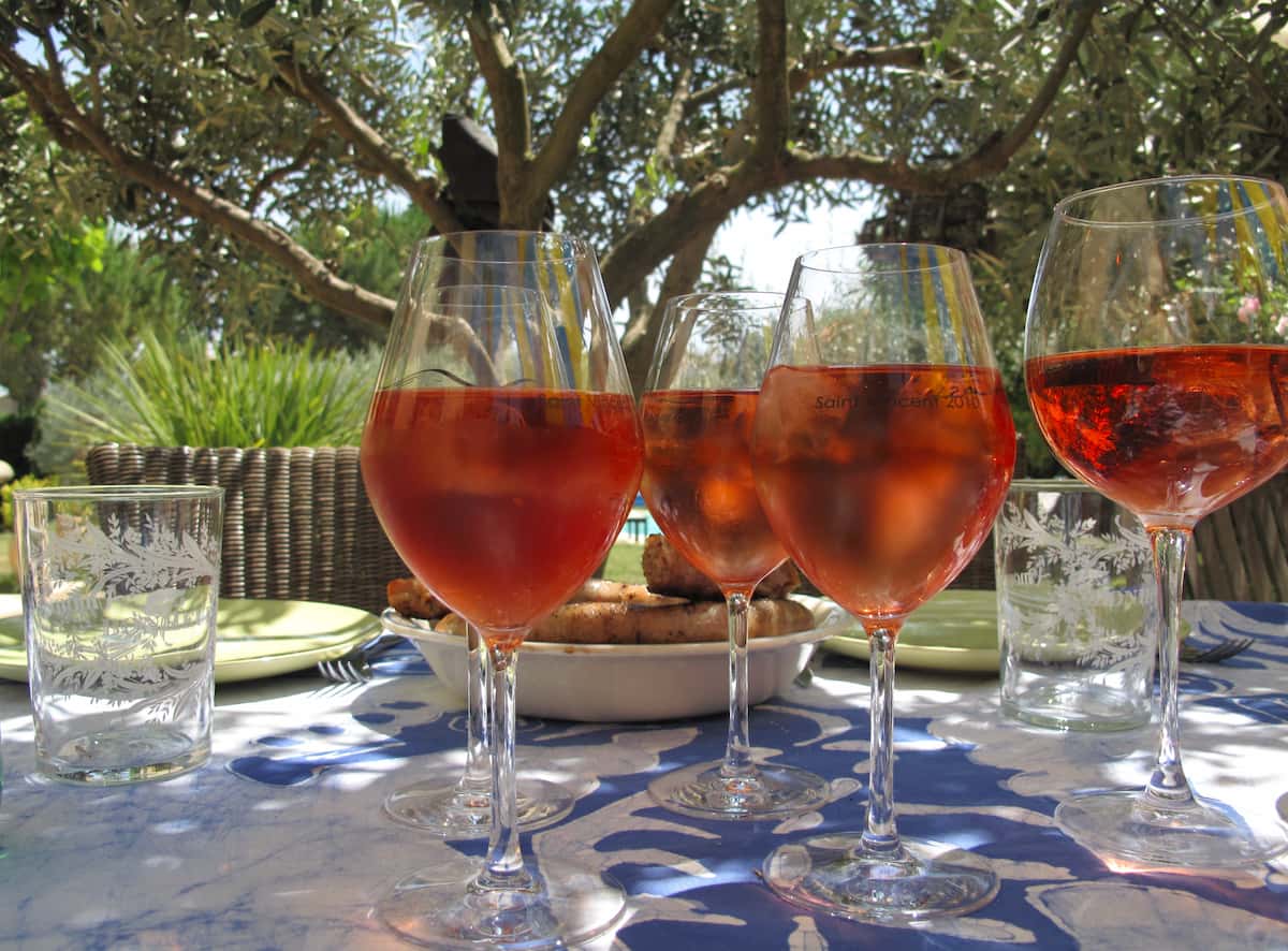 glasses of kir wine cocktail, coloured with blackcurrant liqueur