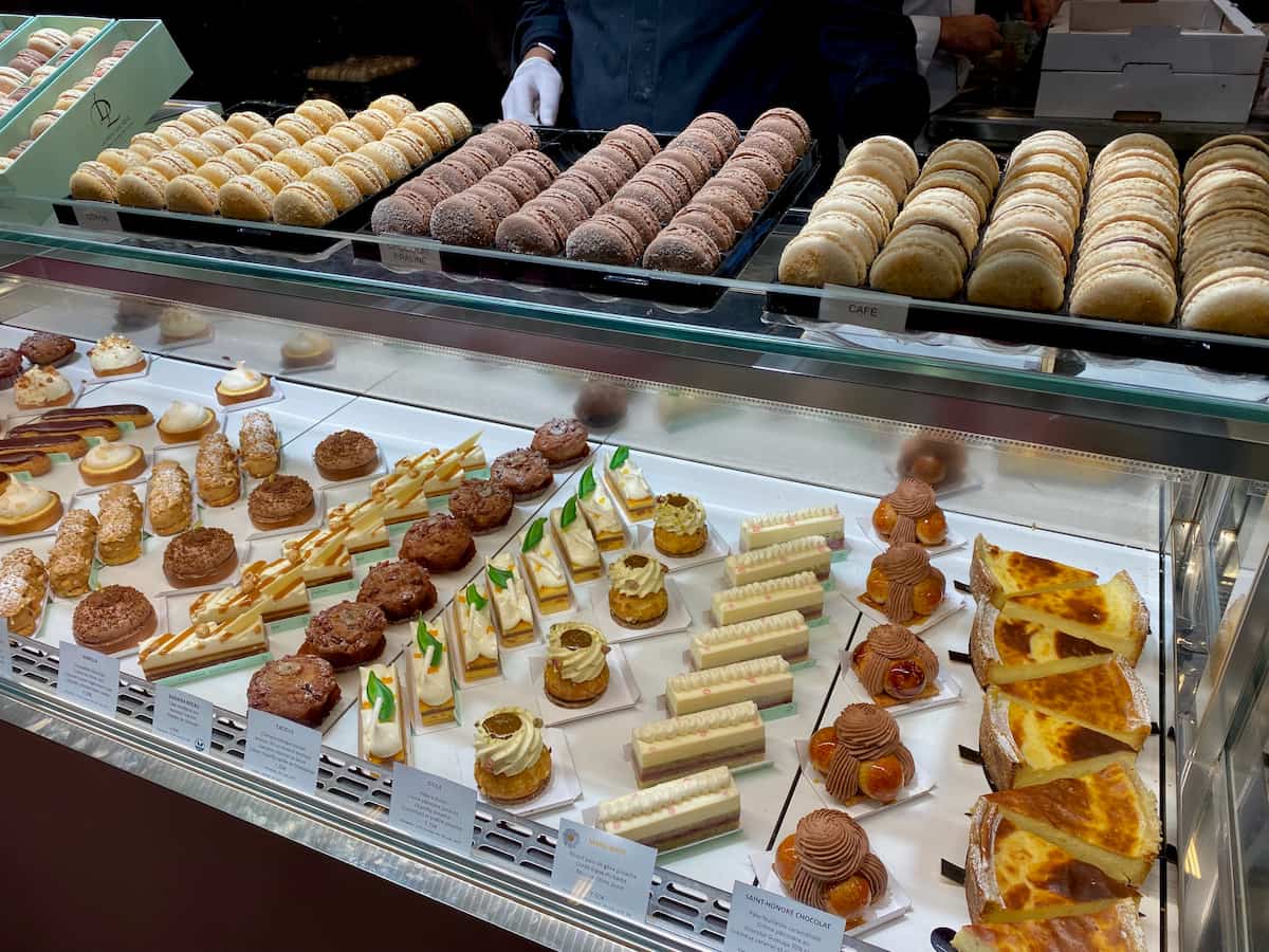 rows of French cakes and macarons
