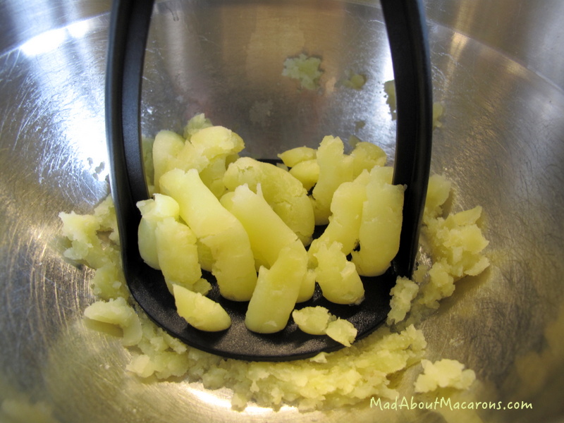 mashing potato to make sweet macaroon bar treats