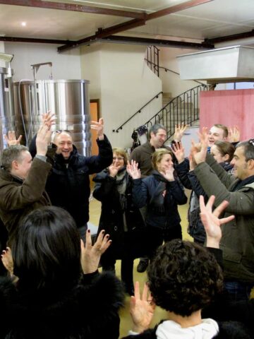 hand waving and singing among the wine growers of Burgundy