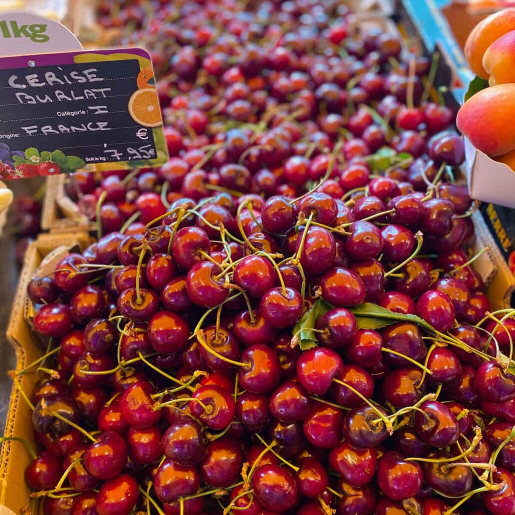 French cherries piled high at the market