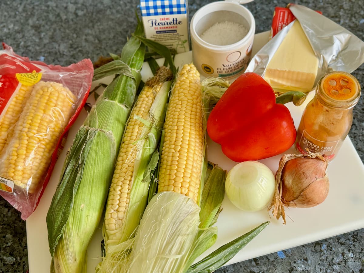 fresh corn on the cob, red bell pepper, 2 small onions, butter, salt, light cream, smoked paprika and a bag of frozen corn as a backup