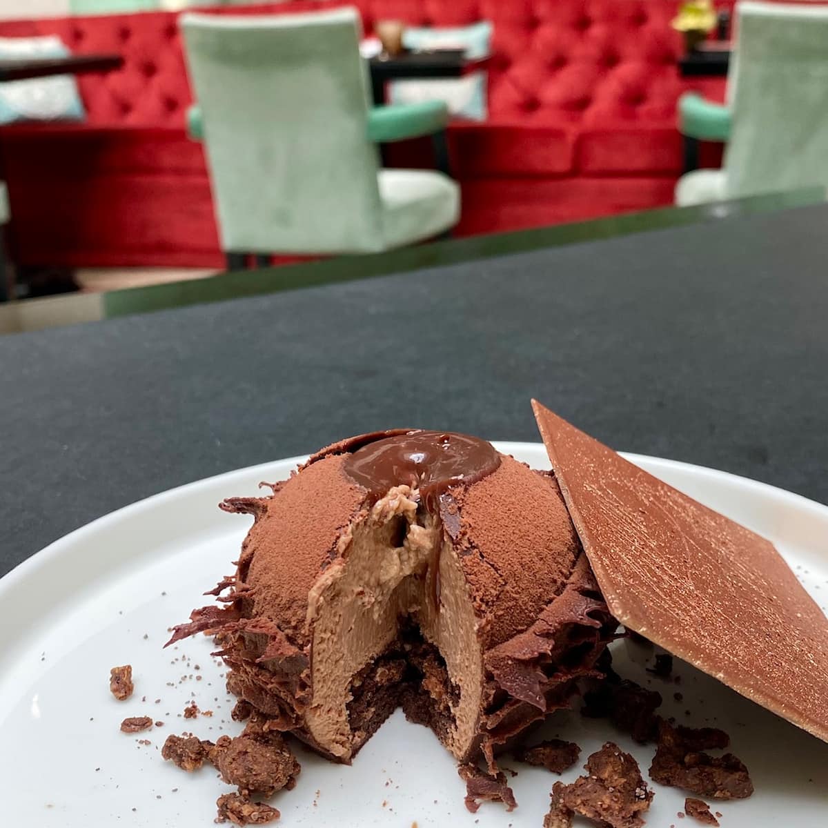 chocolate caramel cake on white plate