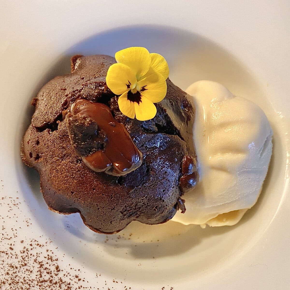 chocolate melted lava cake with ice cream in dish