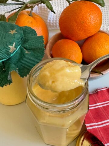 spoonful of creamy orange curd, naturally thickened using egg yolks