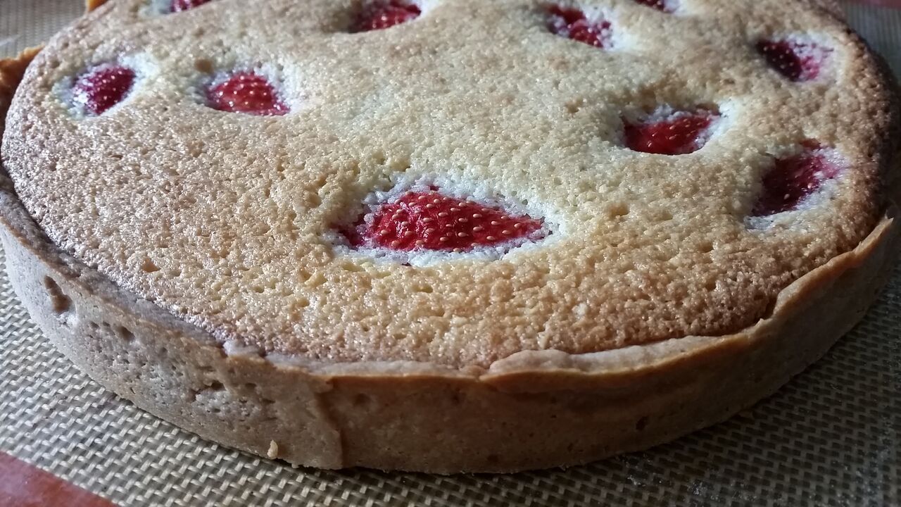 Baked almond strawberry tart out of the oven