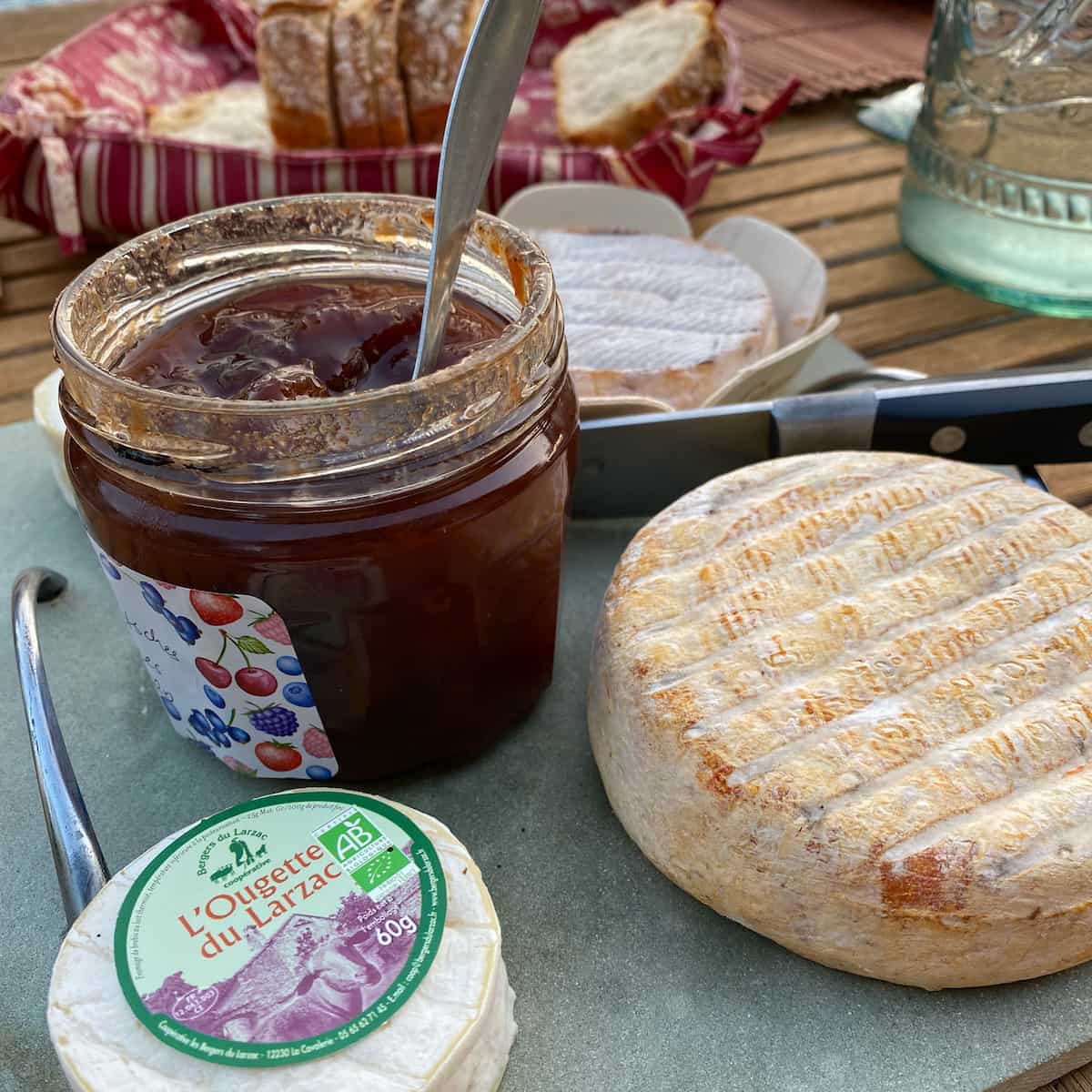 pot of jam on a cheese board