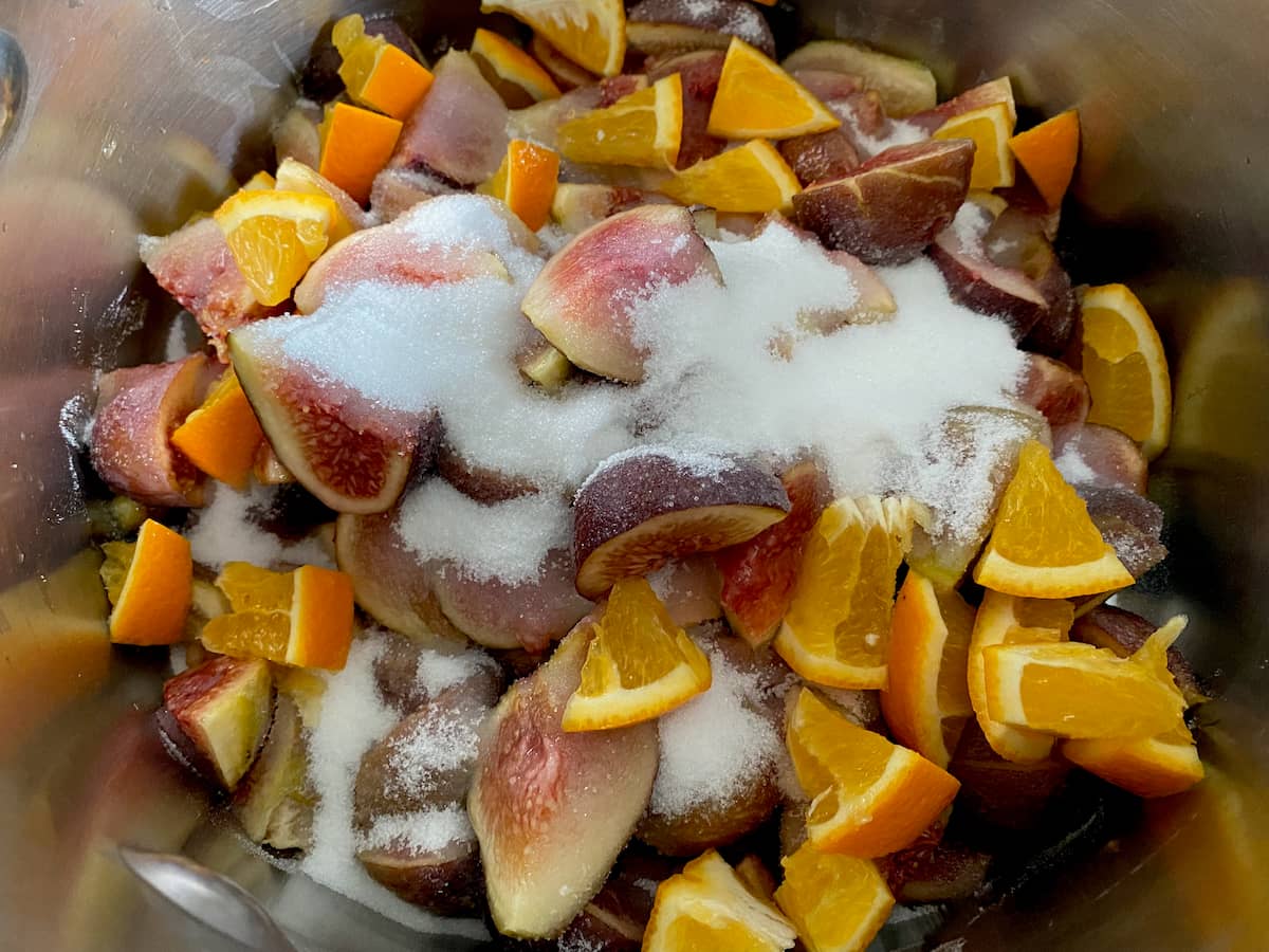chopped figs and orange covered in sugar