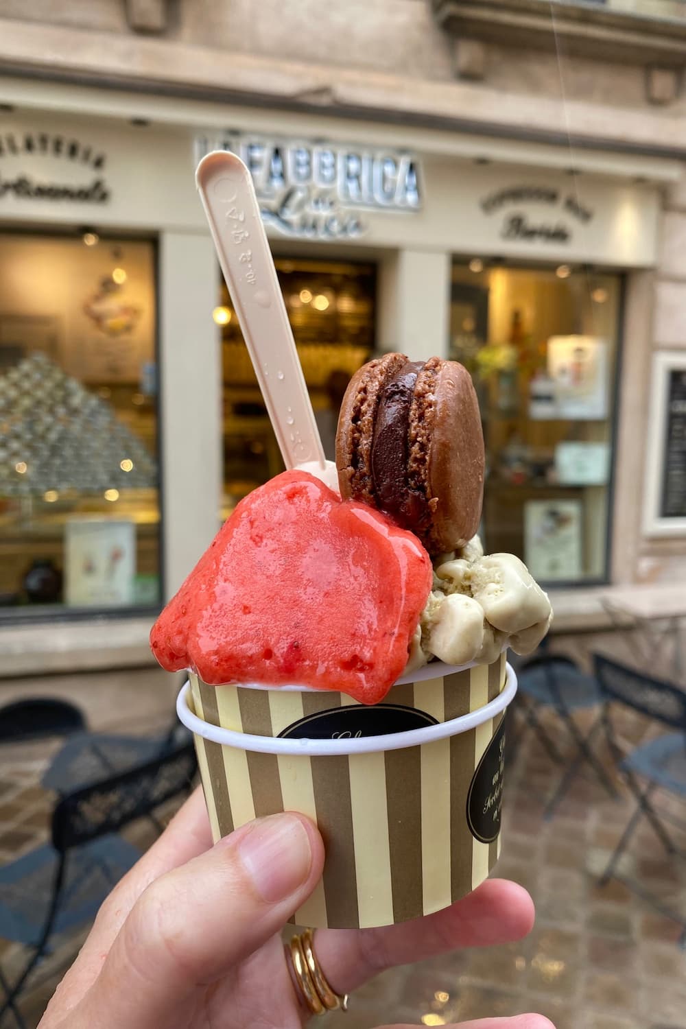 pot of melting ice cream in the rain with chocolate macaron on top