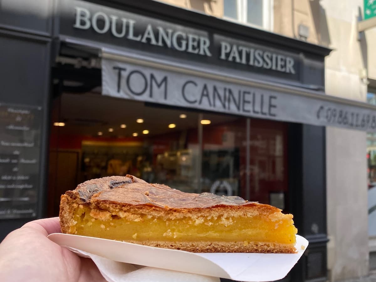 slice of cake in front of bakery