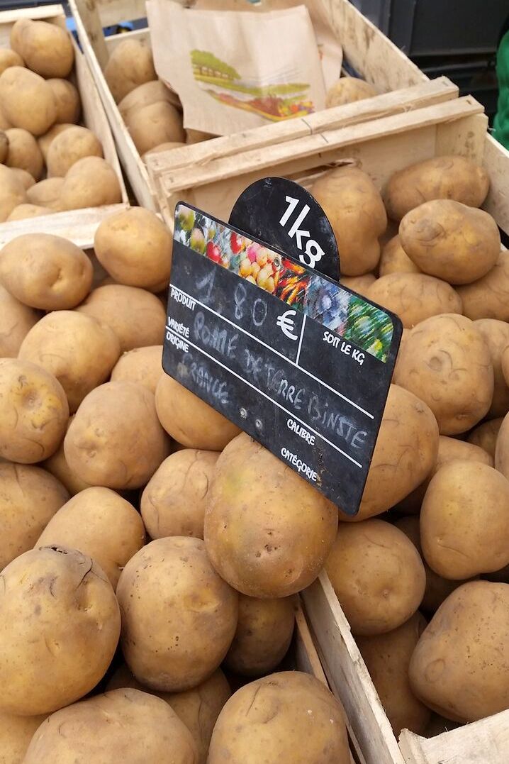 large floury potatoes in French crates