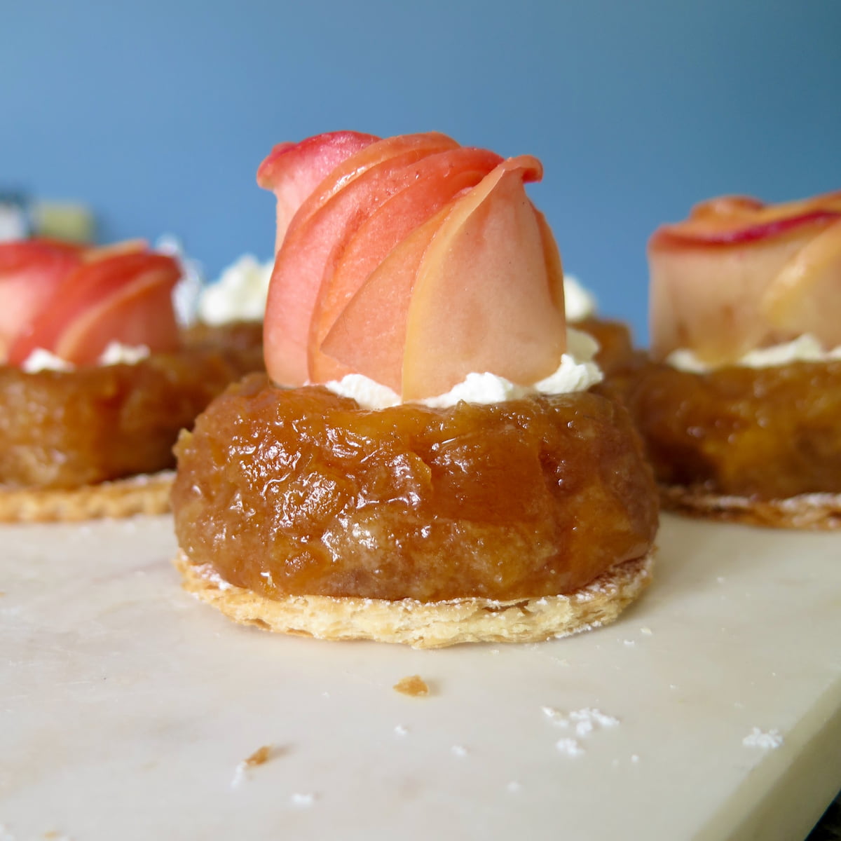 mini apple tarte tatins topped with pink apple roses