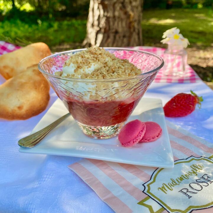 strawberry rhubarb oat crumble with white chocolate mousse in glass dish