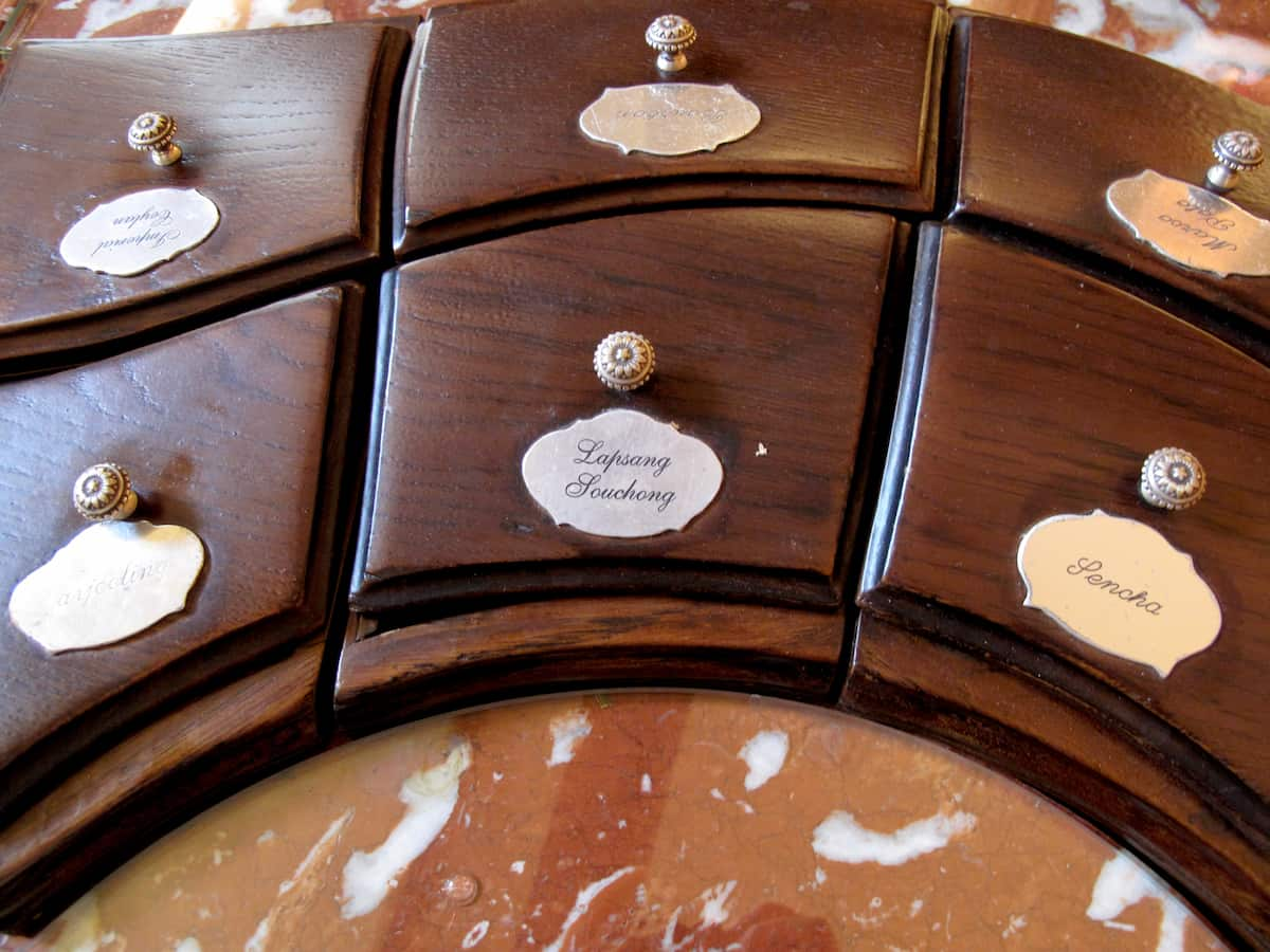 wooden tea chest with names in French