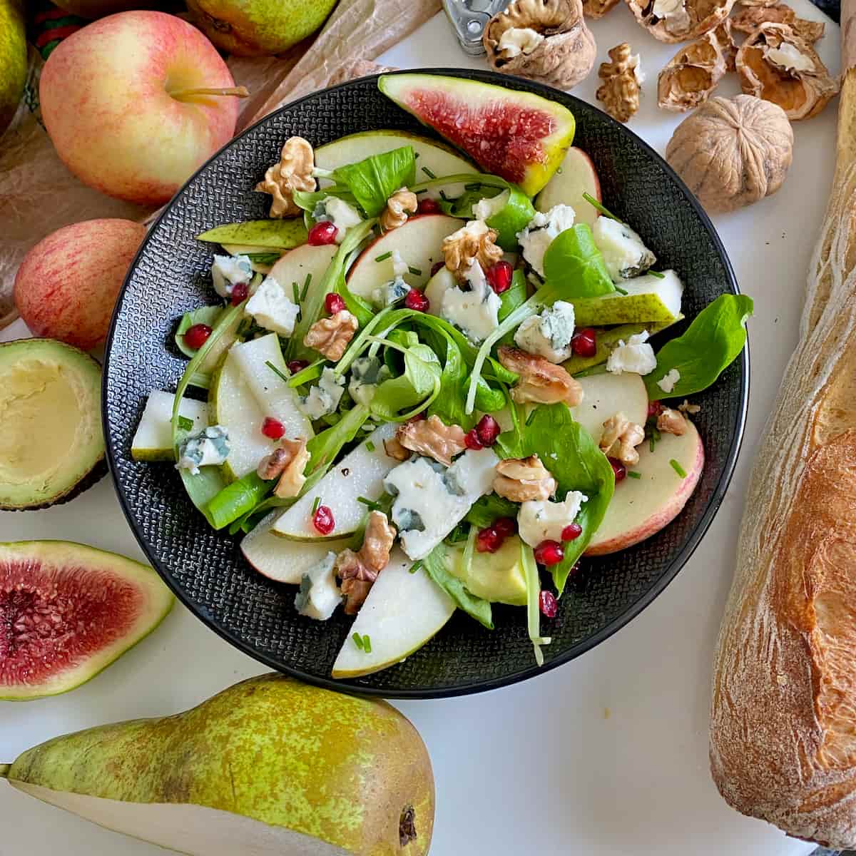 salad with French blue cheese, pear, apple and walnuts