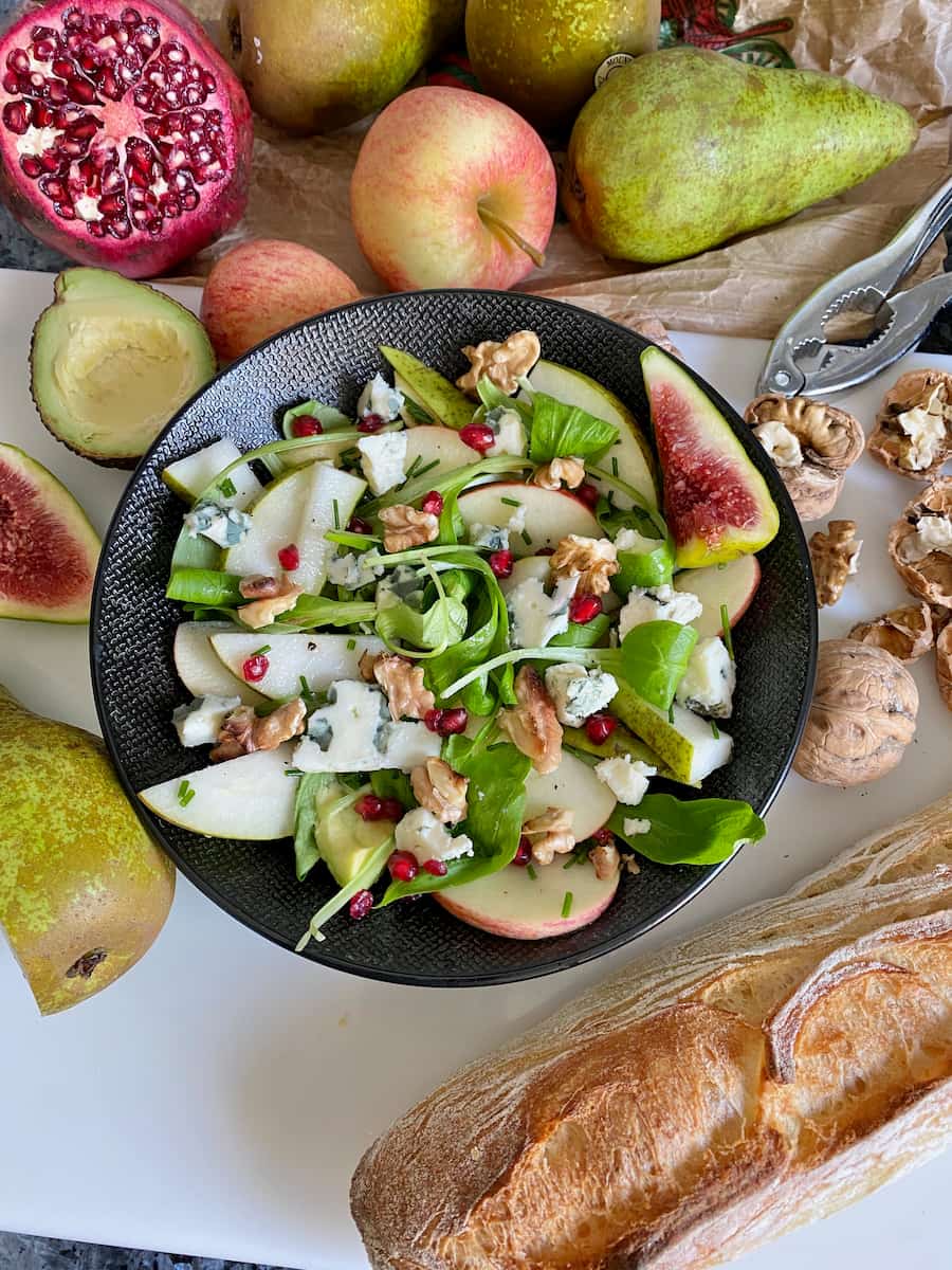 Roquefort salad with greens, French bread and tossed together with apple, pear and walnuts