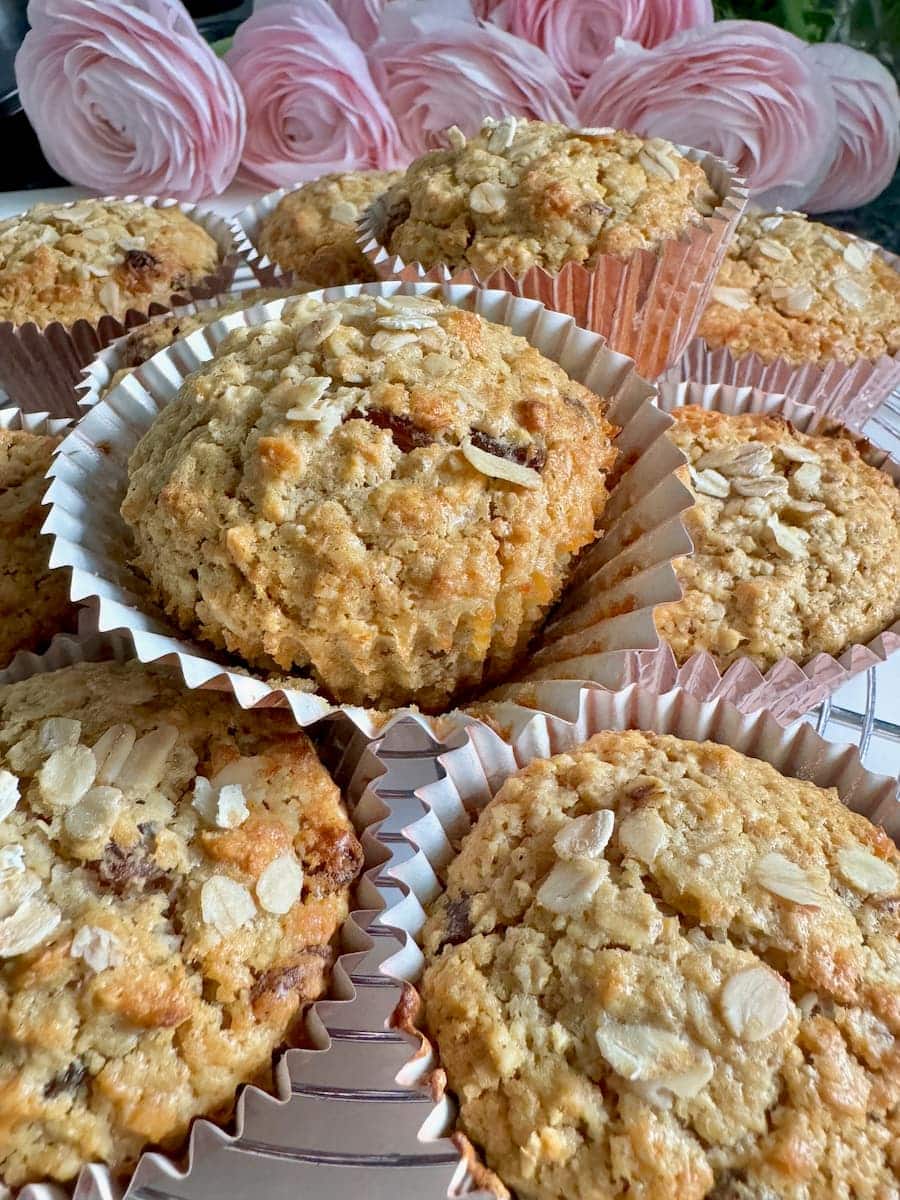 stack of healthy bran muffins cooling in their paper cases