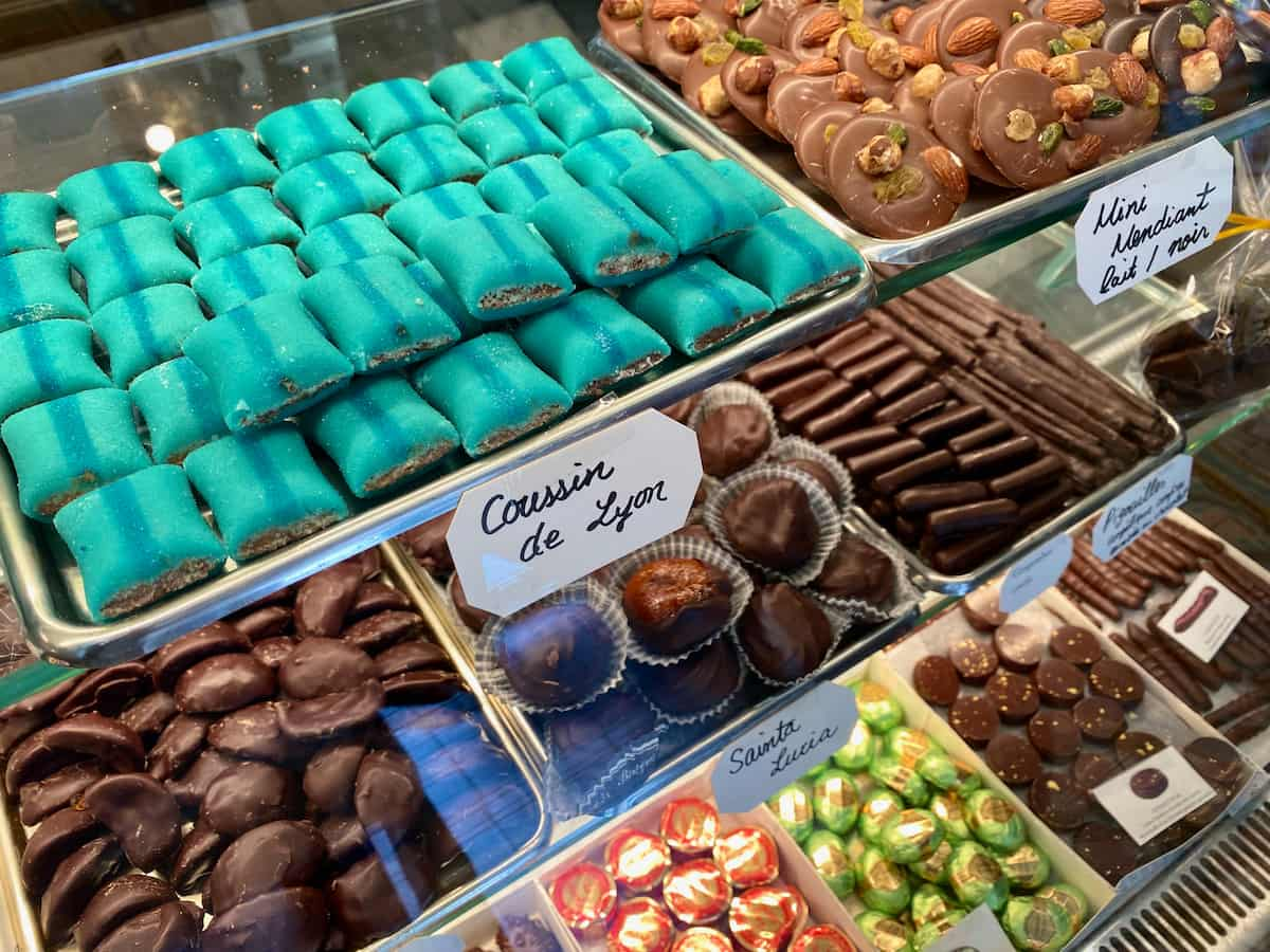 rows of chocolates and French candy in glass case