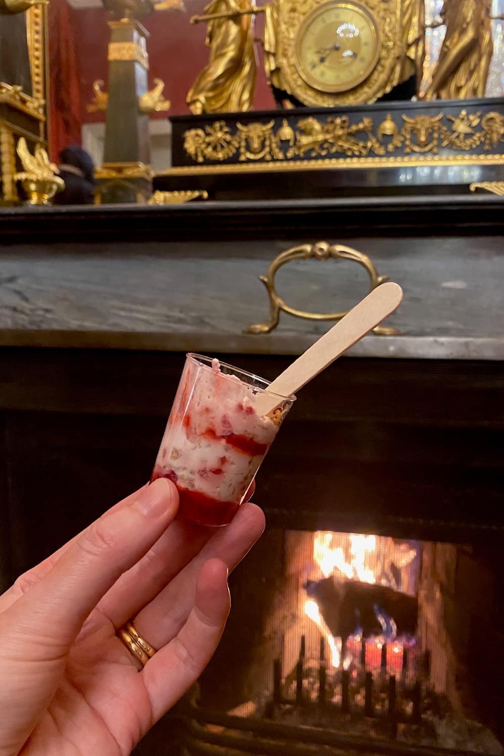 mini cranachan dessert in front of a crackling fire