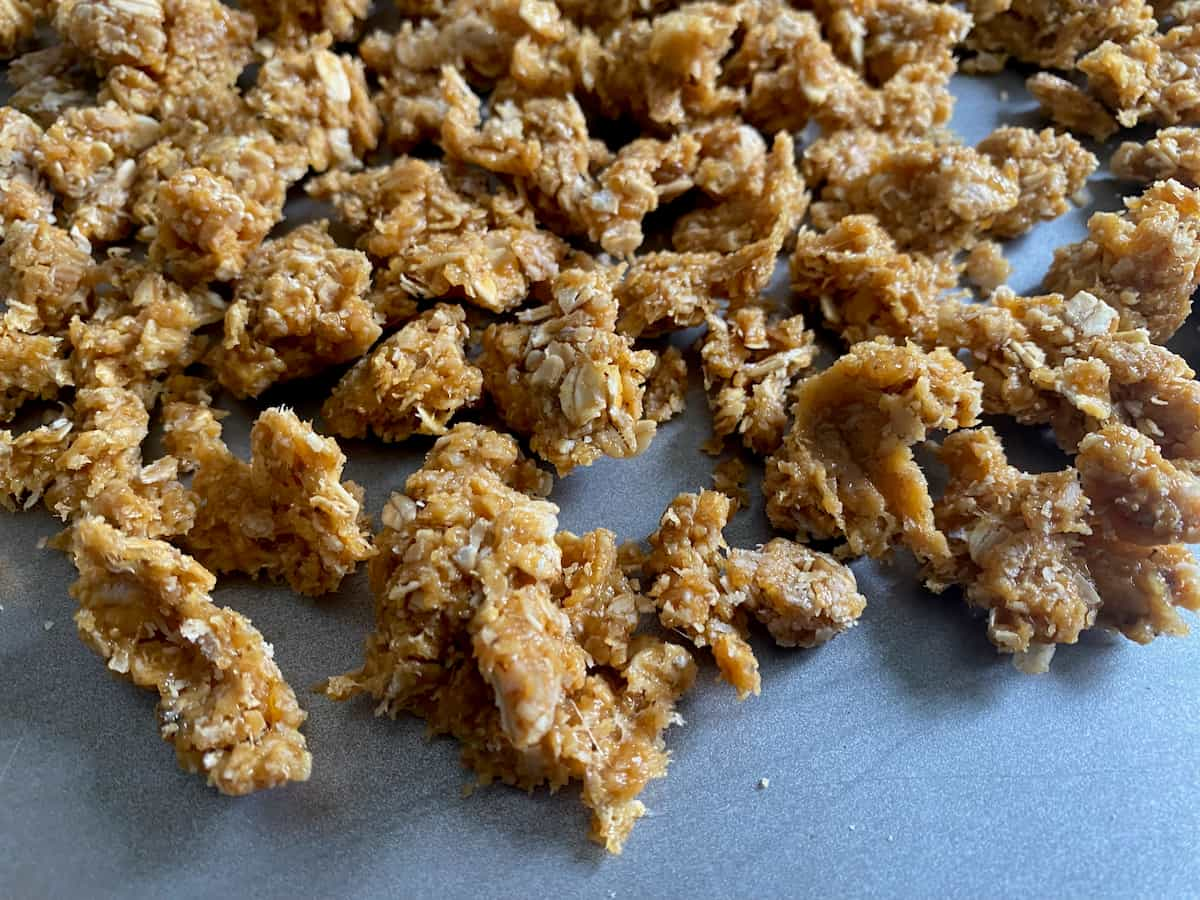 golden oat praline on baking tray