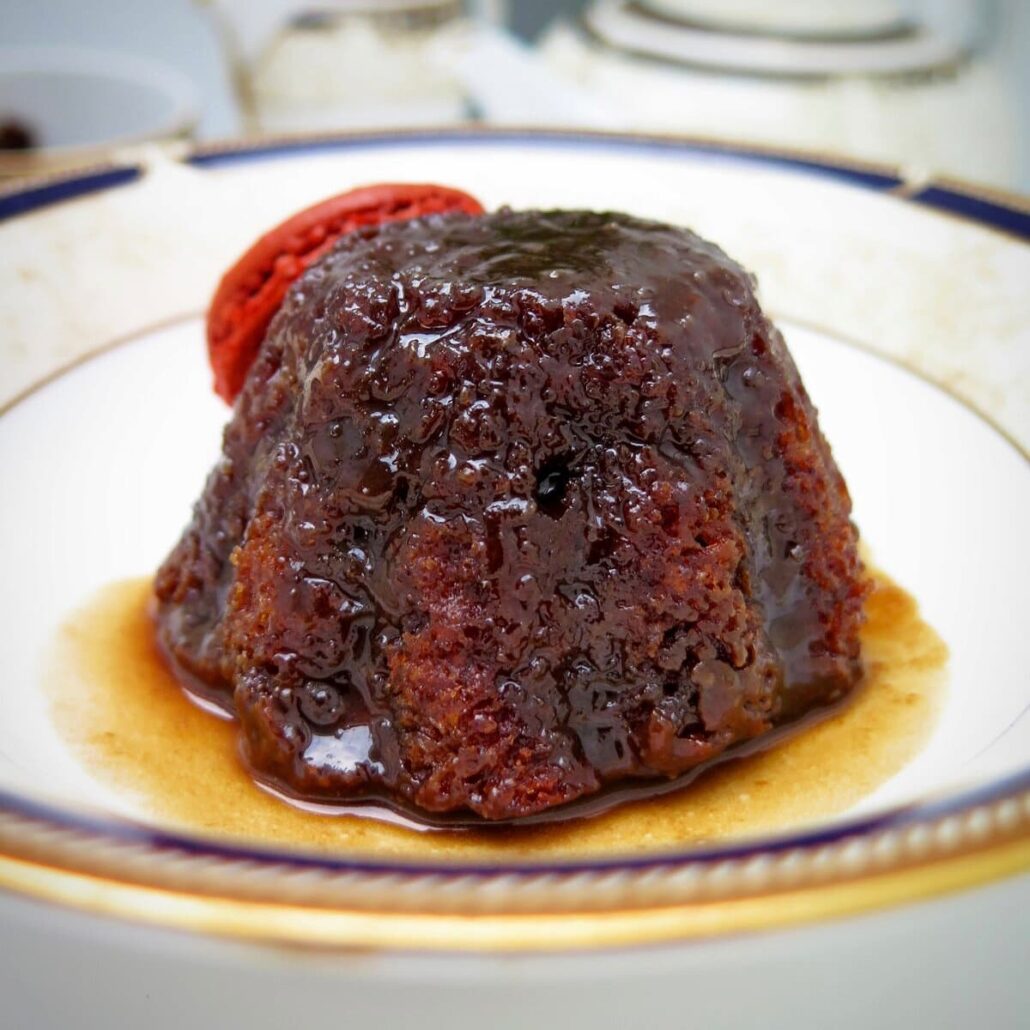 lush sticky toffee pudding with macaron shell