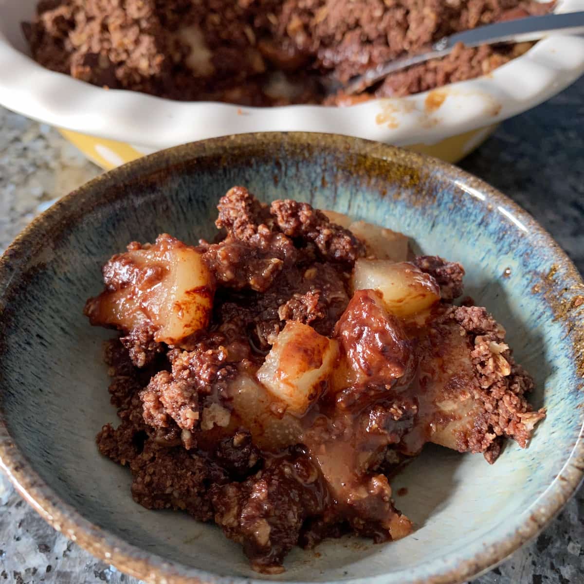bowl of pear crumble with chocolate