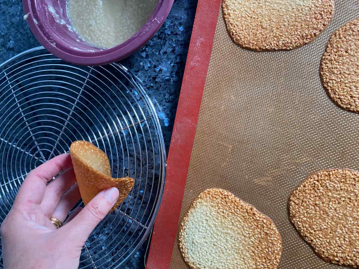 making tuile cookies into their shape
