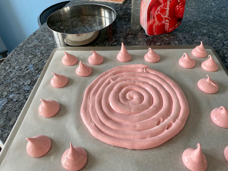 spiral of pink meringue and kisses to go in the oven for an ice cream cake