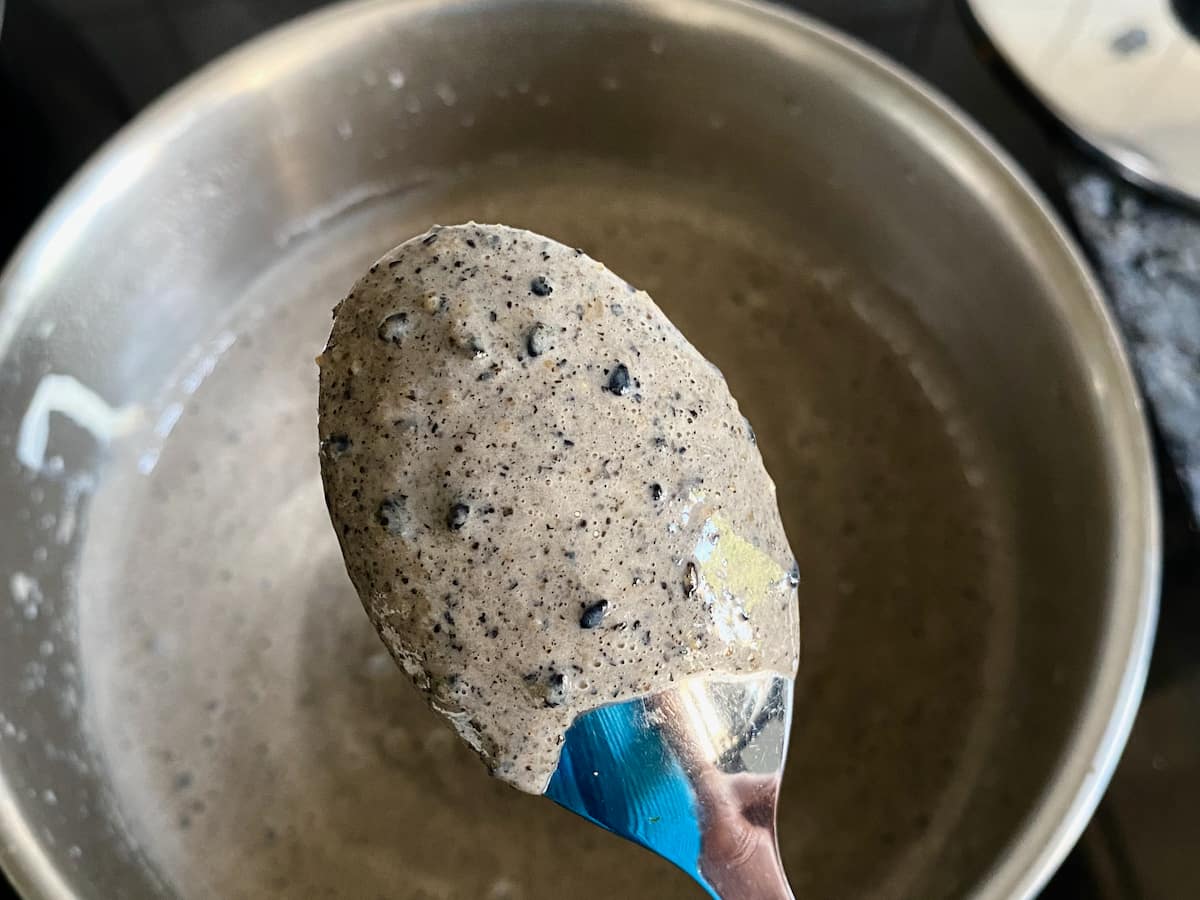 black sesame custard coating back of a spoon