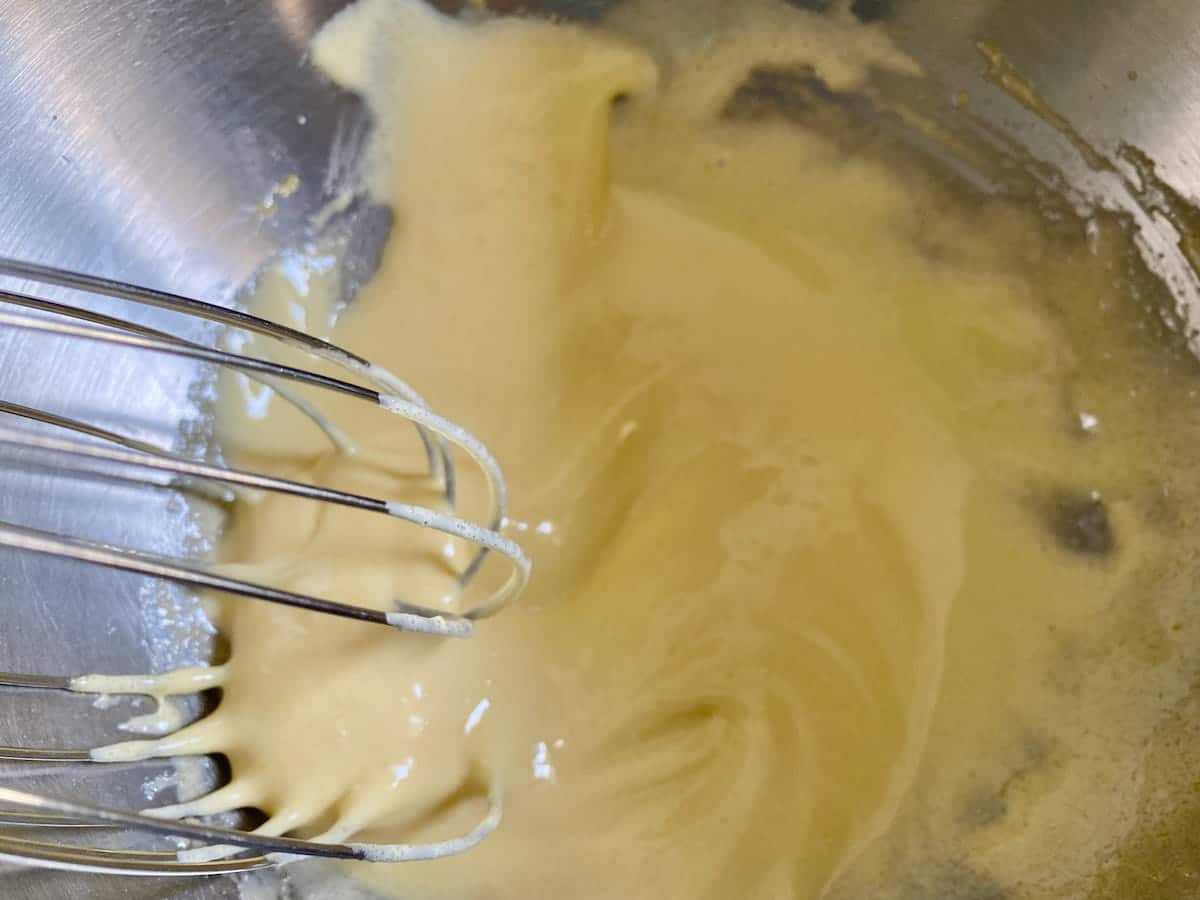 whisking egg yolks and sugar together