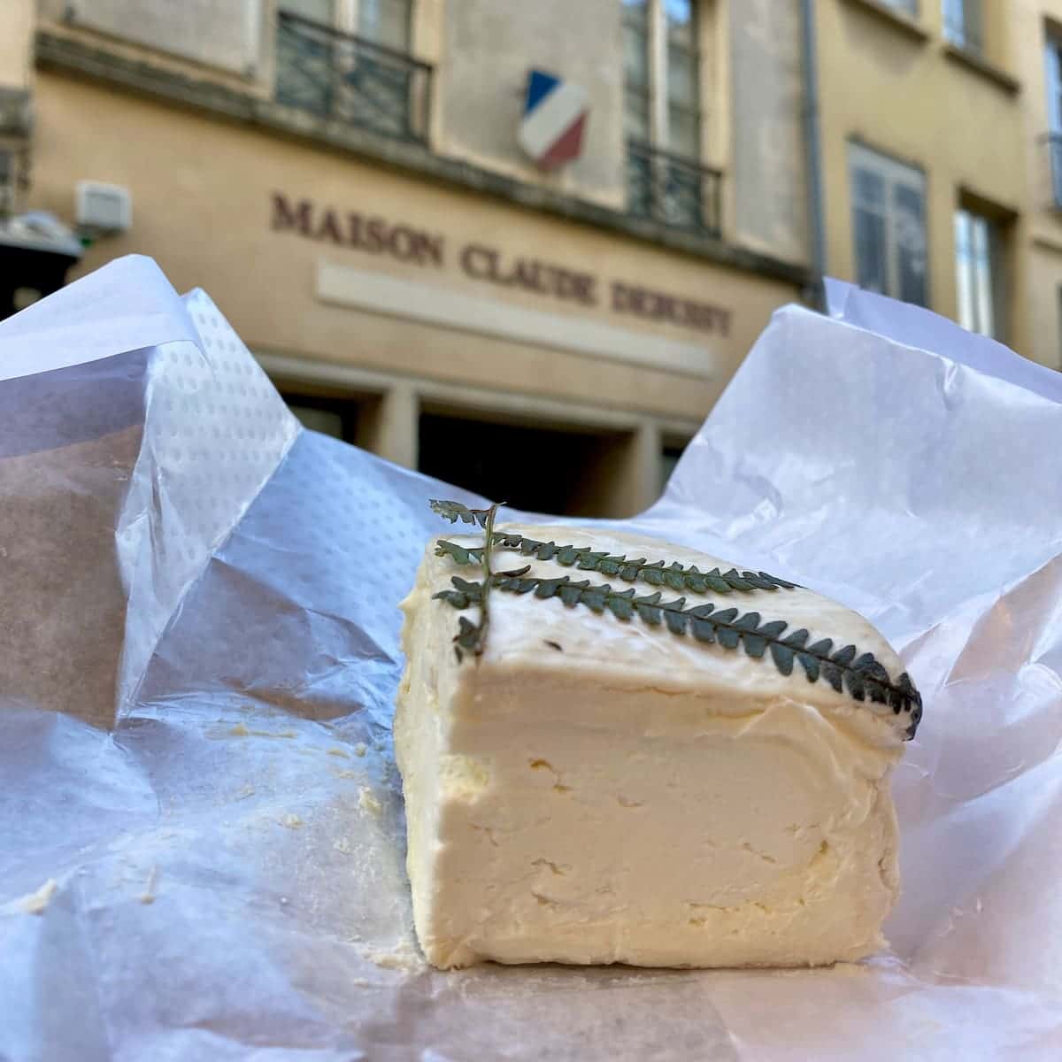 creamy French cheese in its paper