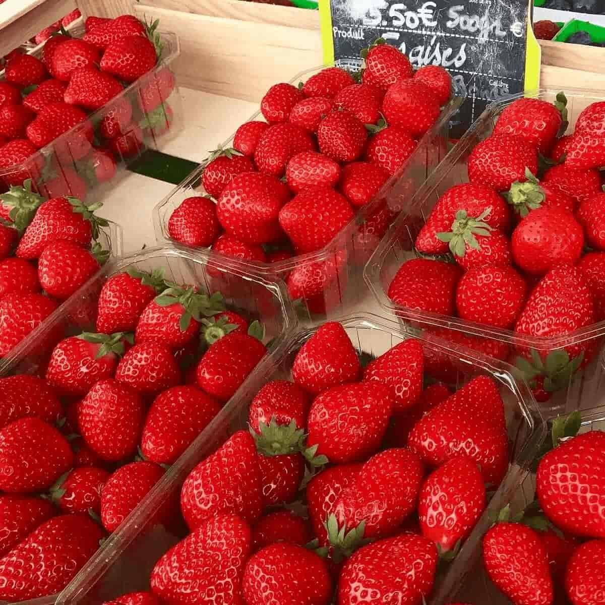 boxes of fresh bright red strawberries