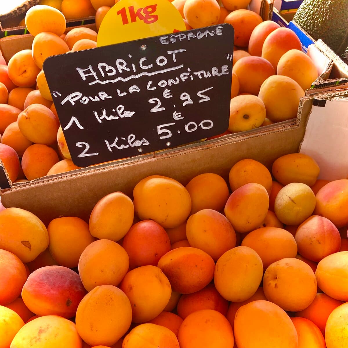 crates of fresh apricots