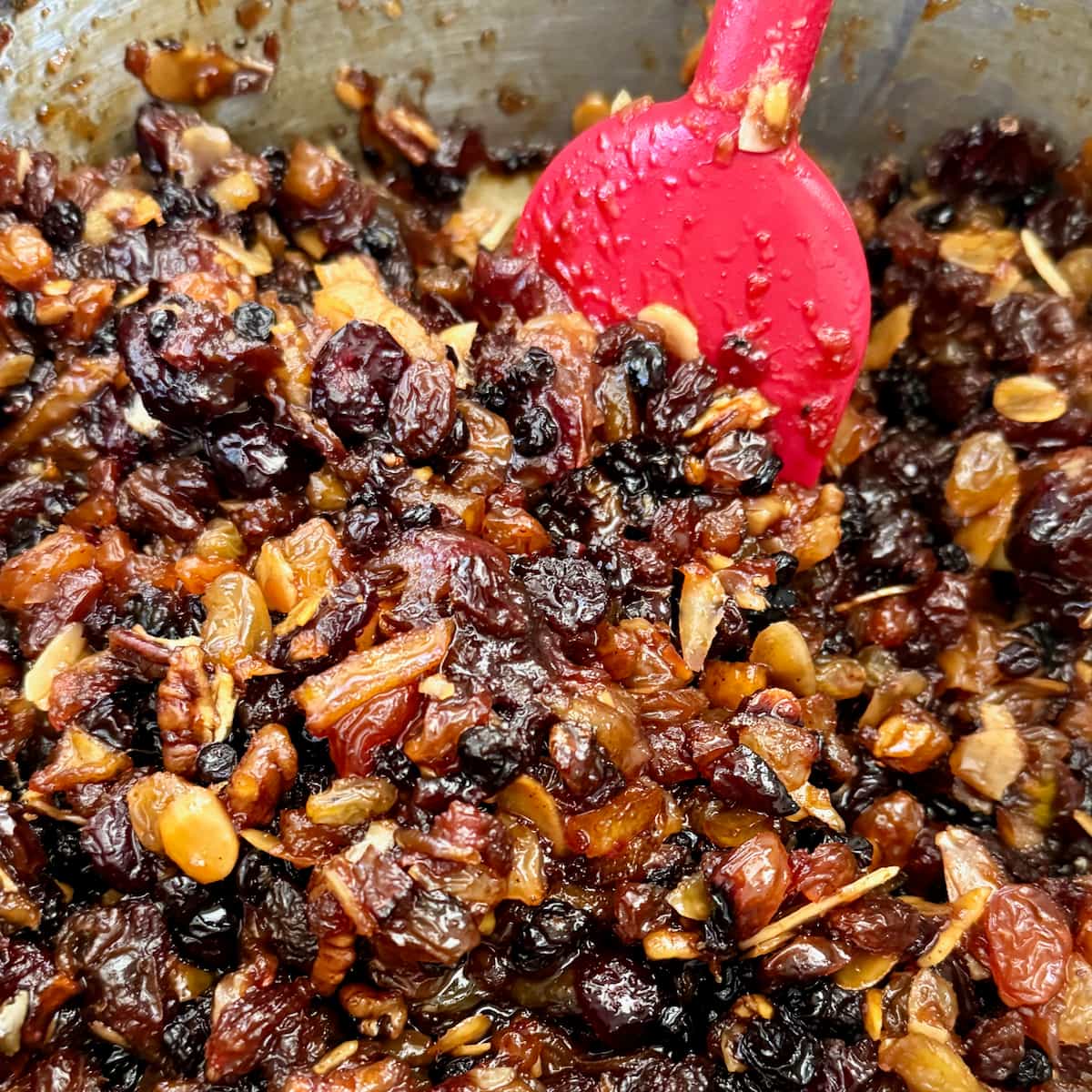 stirring a pot of homemade mincemeat without suet