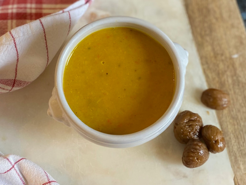 bowl of pumpkin soup with chestnuts