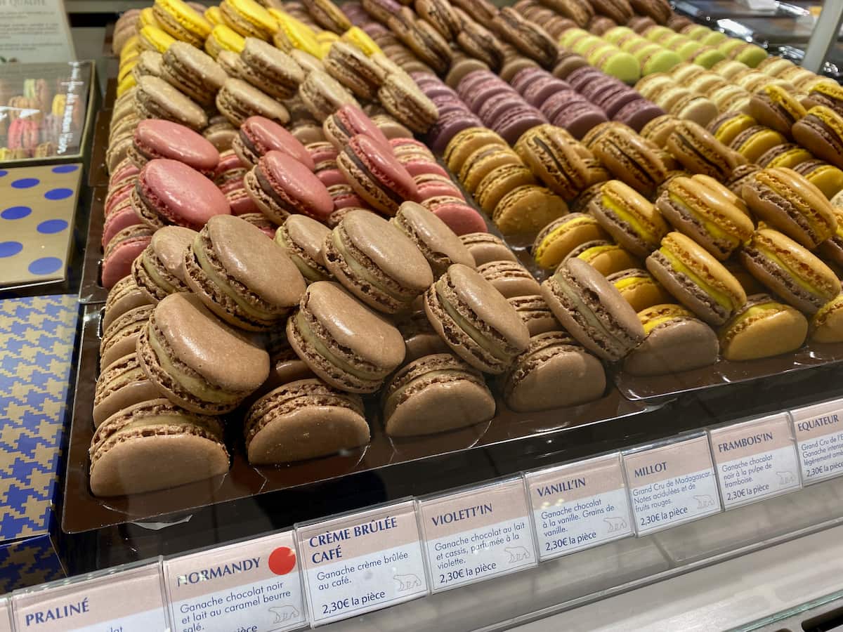 parisian macarons in many colours in the window