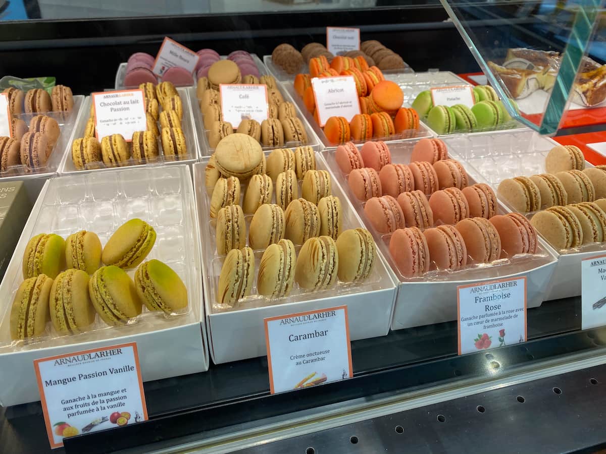 Cafe Pouchine Paris macarons rows of colourful Parisian macarons