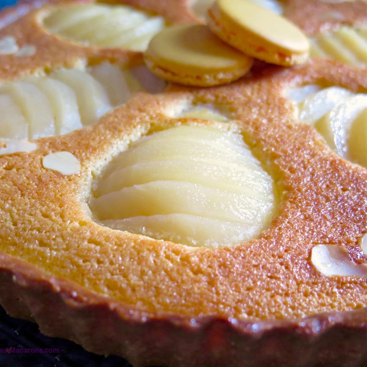 pears sitting in an almond tart