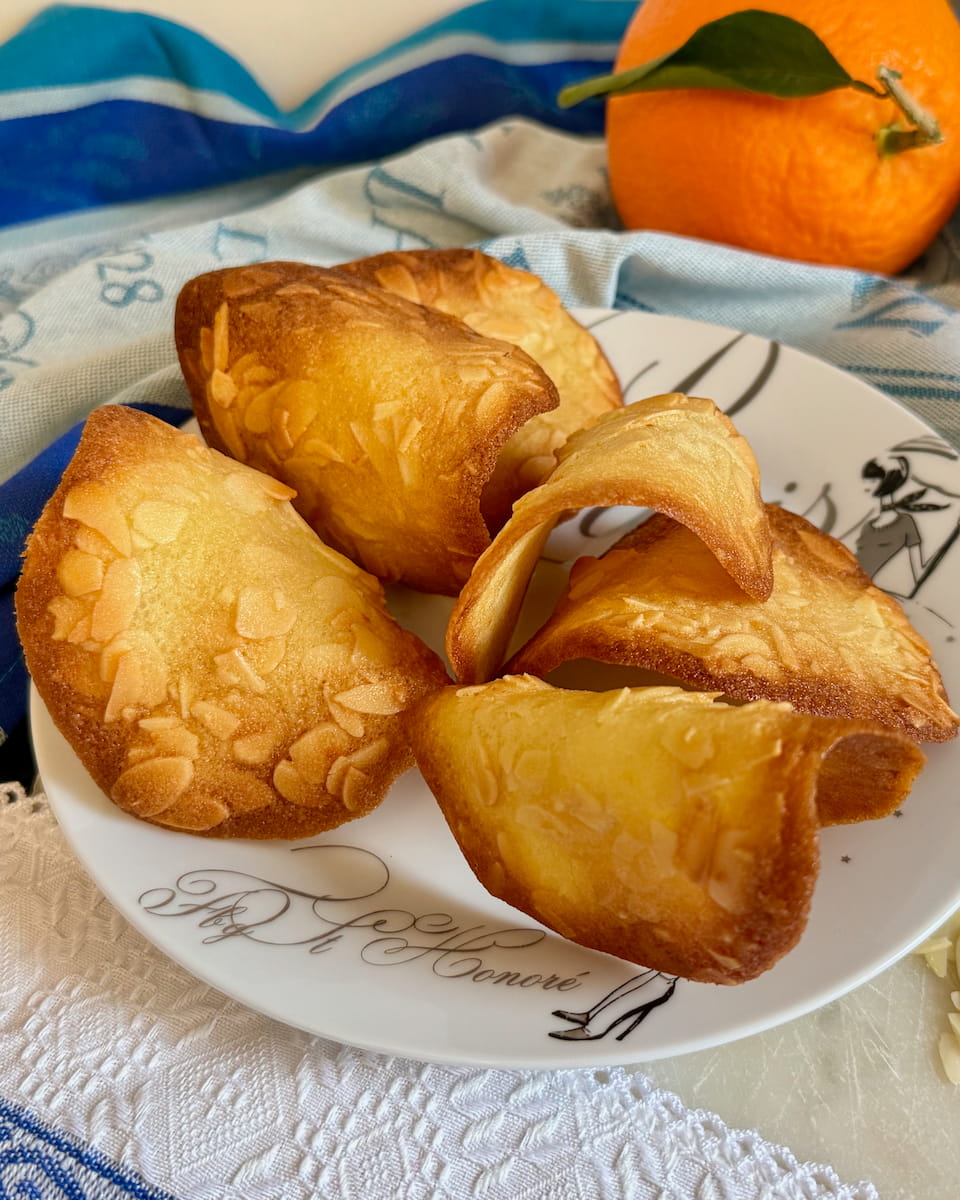 Crispy French almond cookies, called Tuiles curved like tiles