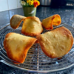 tuiles cookies cooling into their traditional curved shape
