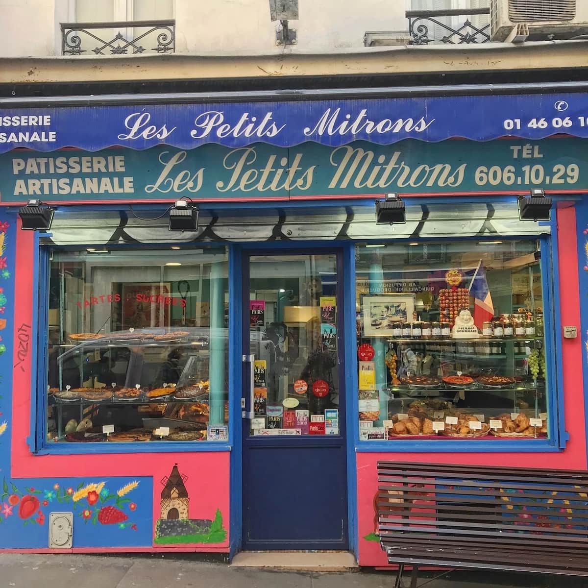 famous tart shop in Montmartre with blue and pink storefront